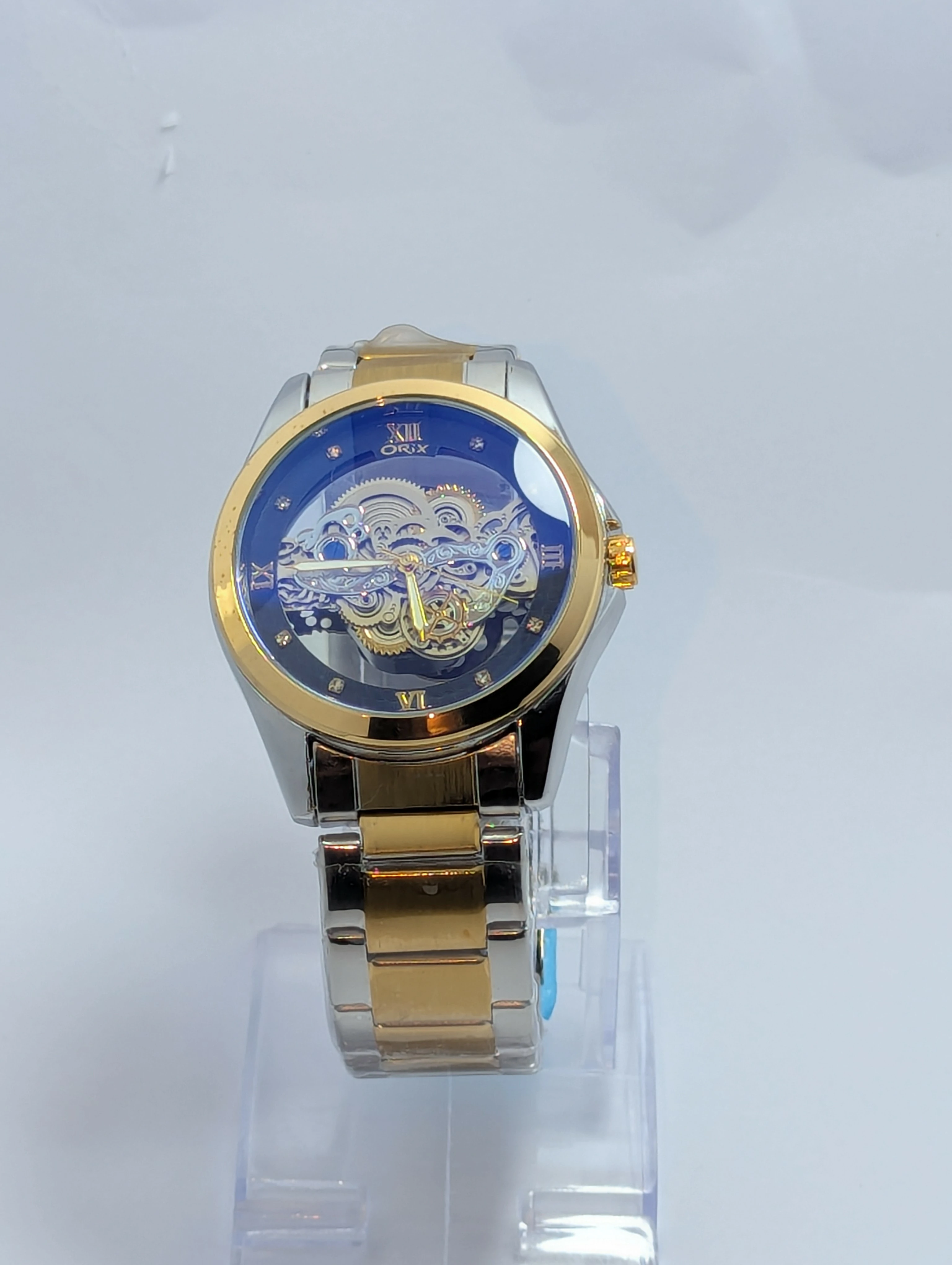 Orix Skeleton Dial Watch (Gold & Silver with Blue Face)